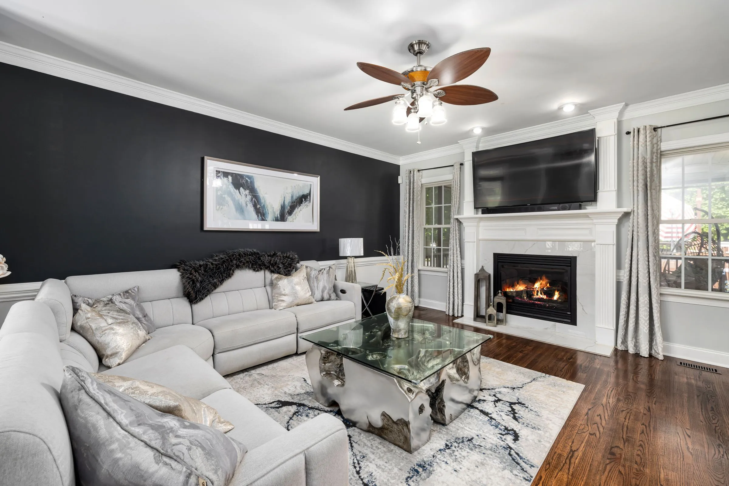 Living room with fireplace and recessed lighting